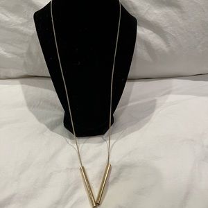 Long gold necklace